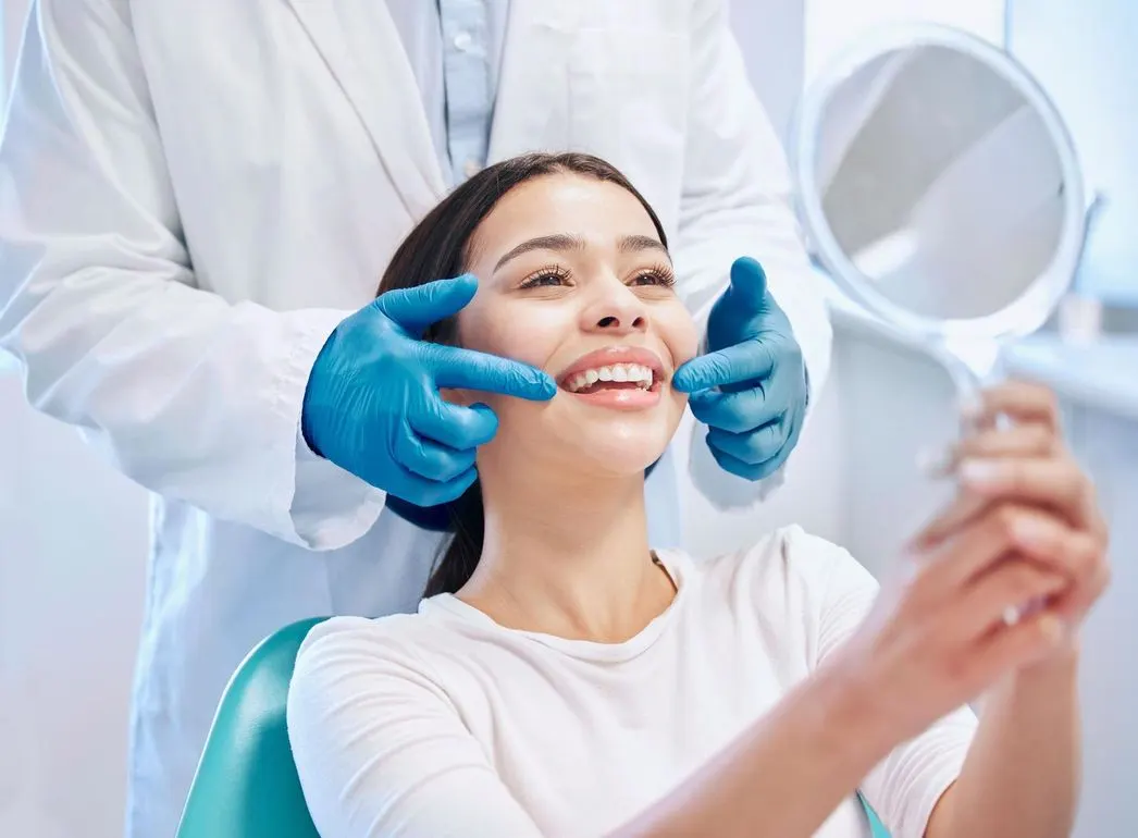 Alpine Dental patient smiling during exam